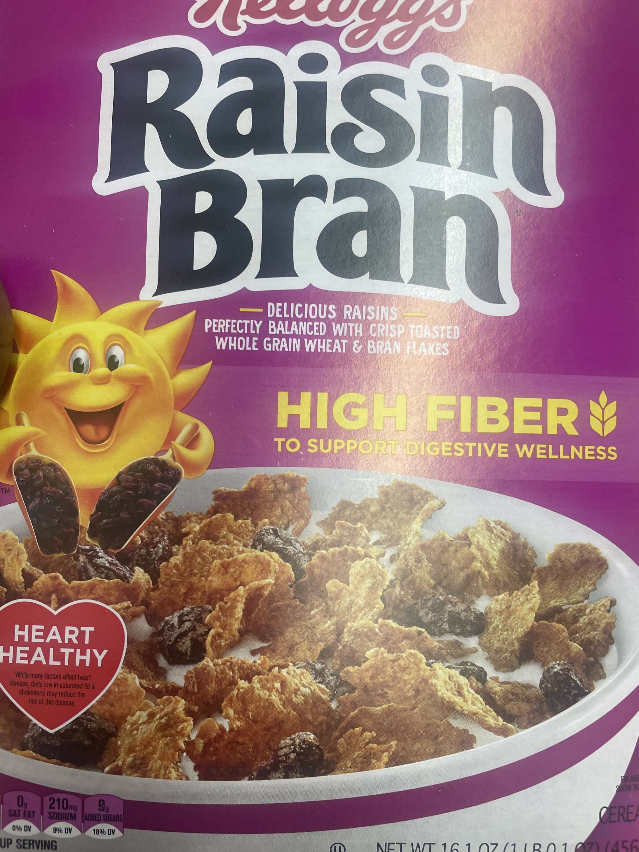 Kellogg's Raisin Bran with cranberries cereal box 13.6 oz featuring heart-healthy multigrain flakes and real fruit